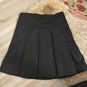 Girls Burberry pleated skirt size 12 in black with tags